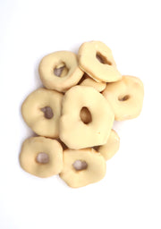 Apfelringe in weißer Schokolade